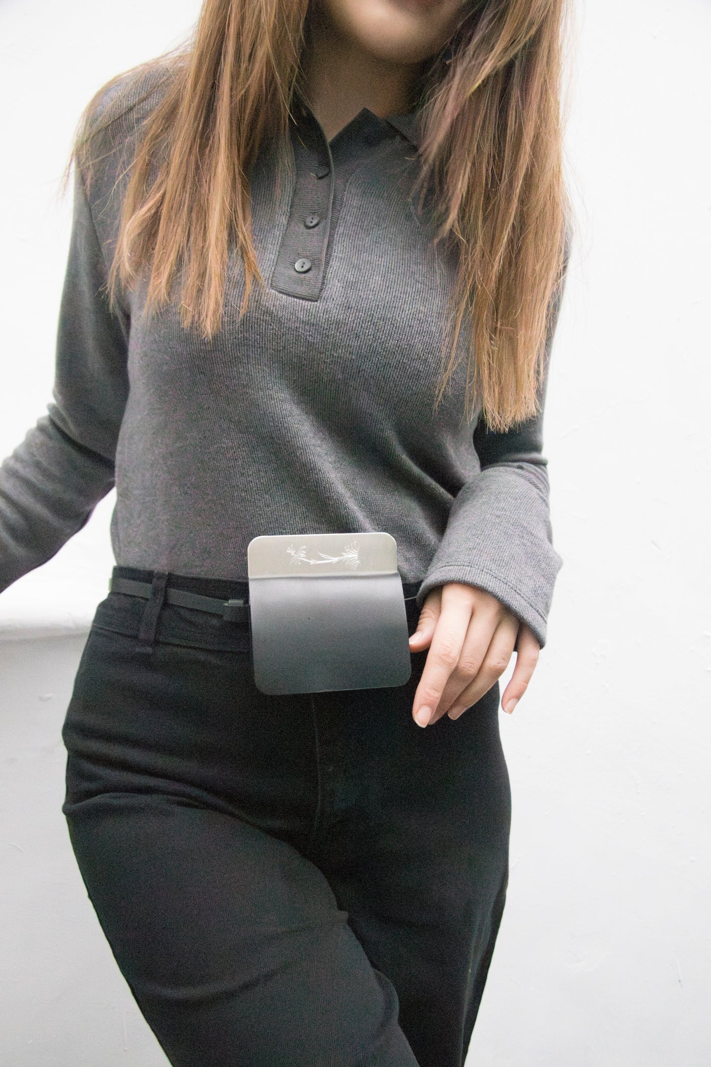 semi-treated silver coated brass/black flap belt bag with signature of Levnî